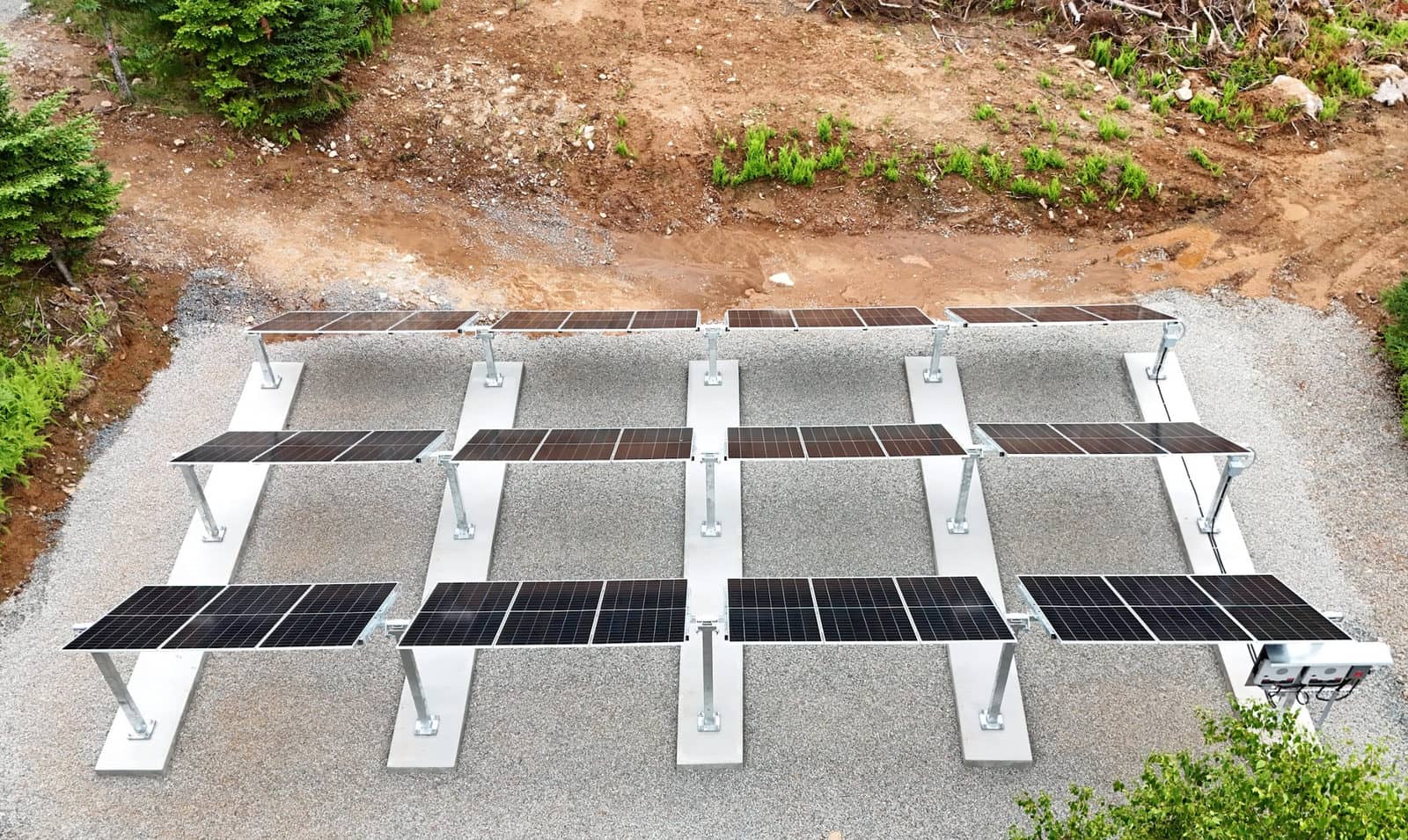 Three 12-panel Post & Beam arrays anchored to concrete pads in Lunenburg